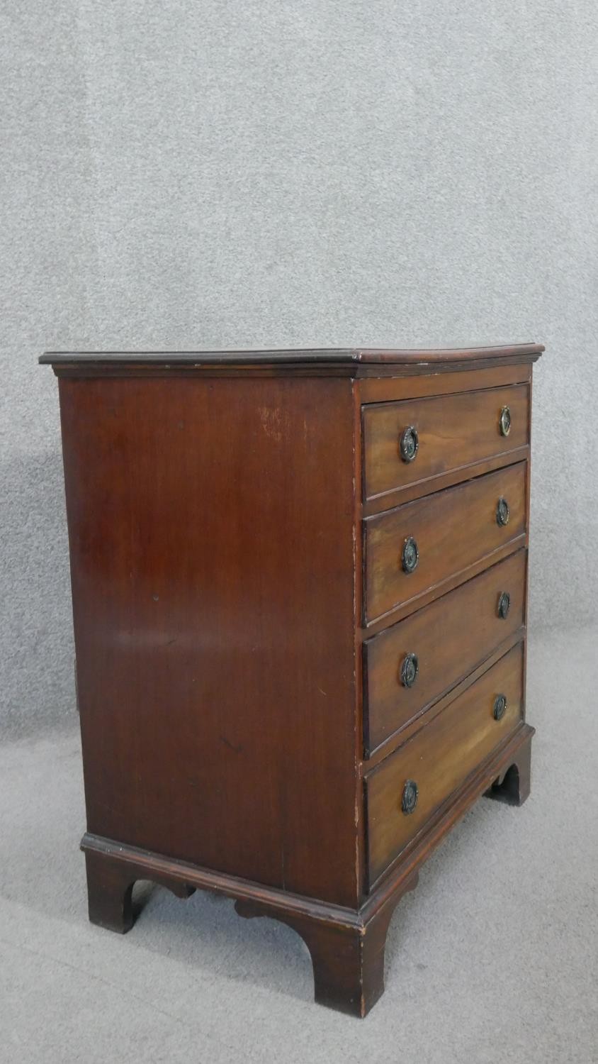 A 19th century mahogany Georgian style small chest of four drawers on shaped bracket feet. H.70 W.62 - Image 5 of 5