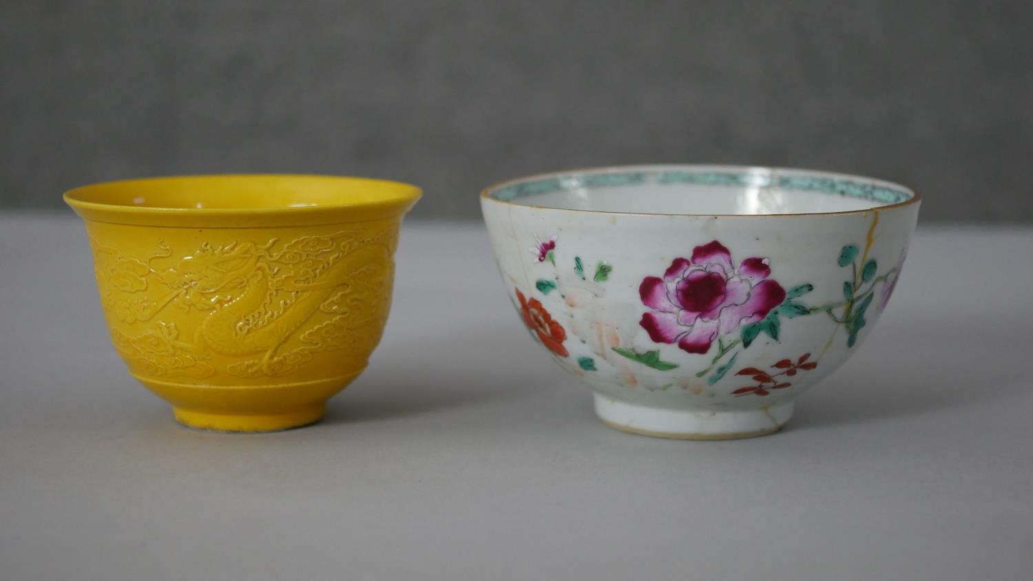 A 19th century Chinese Imperial yellow glaze dragon bowl along with a Famille Rose porcelain tea