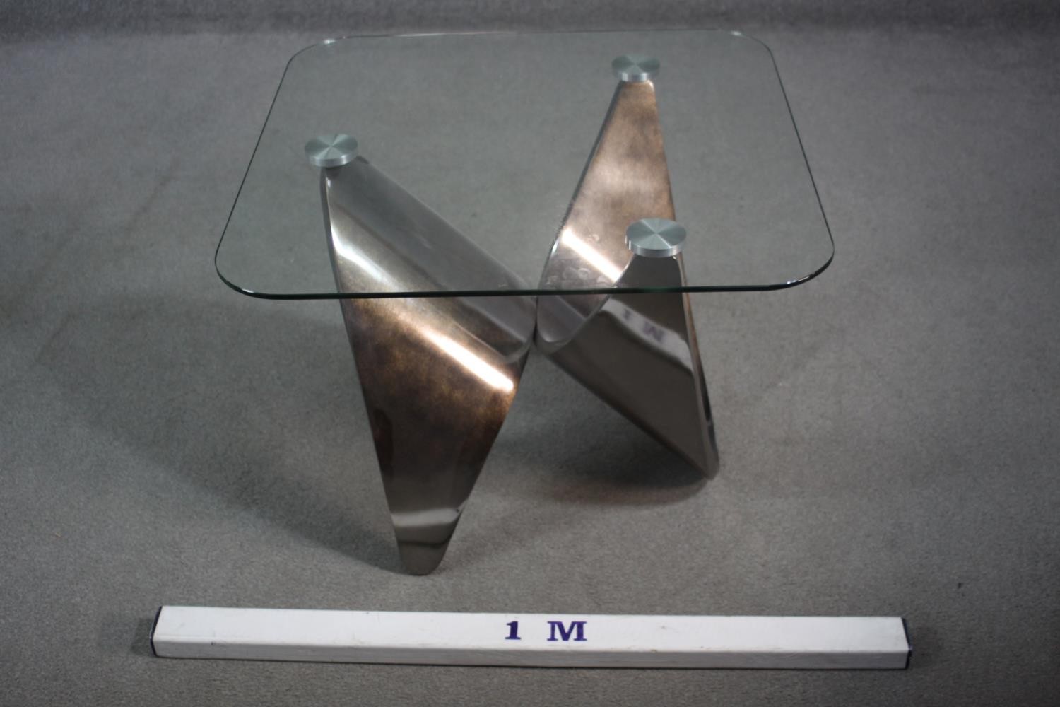 A contemporary occasional table with plate glass top on shaped brushed chromium base. H.55 W.71 D.71 - Image 2 of 6