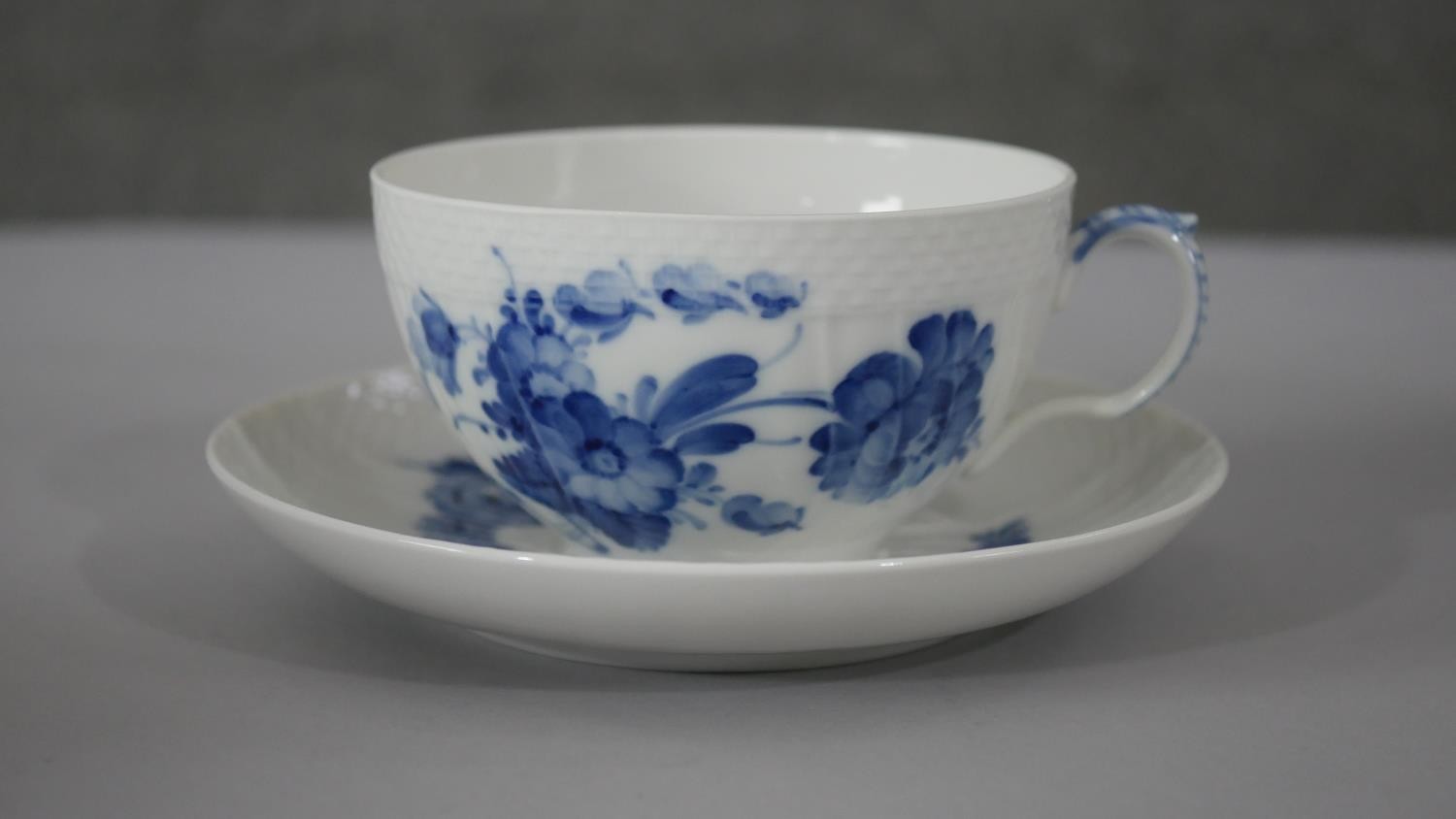 A Royal Copenhagen hand painted porcelain blue and white floral design part four person tea set. - Image 7 of 9