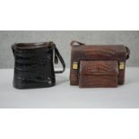 Two vintage brown leather bags. One alligator skin with internal compartments and a leather bucket