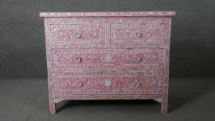 A contemporary painted and lacquered chest of drawers with all over Mother of Pearl inlay. H.87 W.