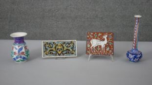 An collection of Turkish ceramics. Including two tiles one with a deer design and two floral