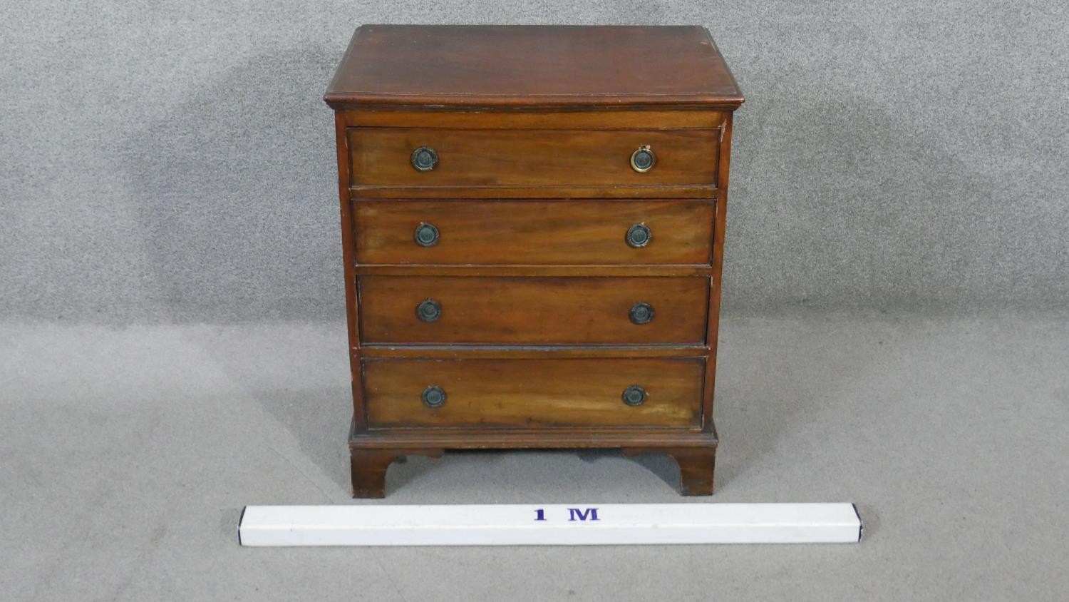 A 19th century mahogany Georgian style small chest of four drawers on shaped bracket feet. H.70 W.62 - Image 2 of 5