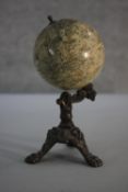 A Victorian terrestrial desk globe by J.L. & Cie, PARIS on repousse bronze foliate design tripod