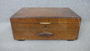 An Art Deco silver plated part twelve person oak cased canteen by Lickorish & Co, Sheffiled and