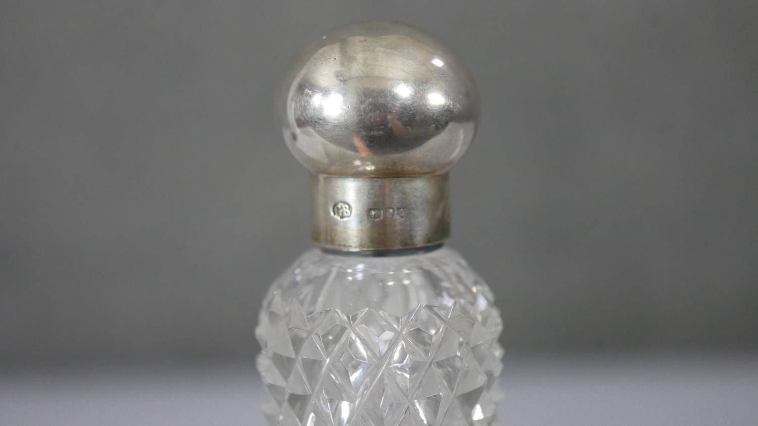 A Victorian 'lay down' cut glass perfume flask with silver top. Hallmarked: GB for George Byworth, - Image 3 of 6