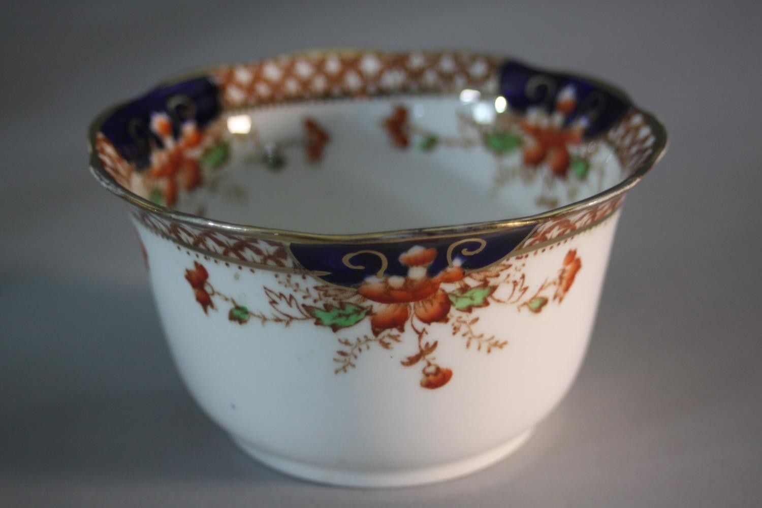 A Roslyn china seven person part tea set. Decorated with a floral design. Includes cups and saucers, - Image 4 of 10