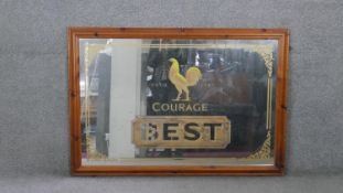 A large pine framed vintage Courage Best Bitter advertising mirror. Gilded lettering and rooster