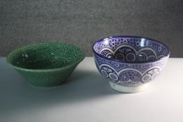 A Majolica green glaze vine leaf and woven design fruit bowl along with a hand painted Islamic