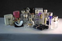 A collection of vintage empty cosmetic and perfume bottles. Some with boxes.