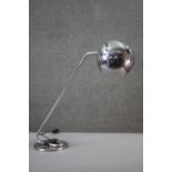 A vintage chrome anglepoise style lamp with globe shade. H.57 W.60cm.