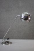 A vintage chrome anglepoise style lamp with globe shade. H.57 W.60cm.