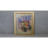 A 20th century framed oil on board of a vase of flowers. Signed A Watson, 1945. H.60 W.50cm