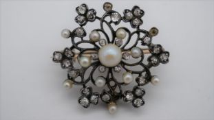 A Victorian metamorphic yellow and white metal (tests as 9ct and silver) floral and clover design