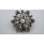 A Victorian metamorphic yellow and white metal (tests as 9ct and silver) floral and clover design