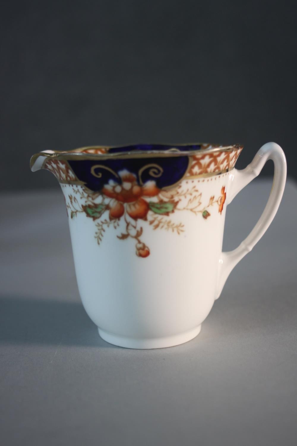 A Roslyn china seven person part tea set. Decorated with a floral design. Includes cups and saucers, - Image 7 of 10