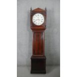 An early 19th century mahogany longcase clock, painted dial and black Roman numerals with eight