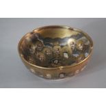 A Meji period hand painted and gilded satsuma bowl with scalloped edge and decorated with twelve