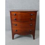 A Georgian mahogany bow fronted commode on swept supports. H.70 W.60 D.40cm