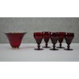 A collection of ruby glass. Including a set of five vintage Bohemian ruby stemmed wine glasses and a