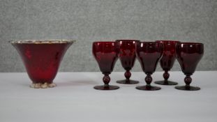 A collection of ruby glass. Including a set of five vintage Bohemian ruby stemmed wine glasses and a