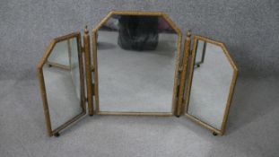 A mid century gilt framed adjustable triptych dressing table mirror. H.46 W.80cm