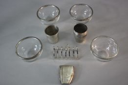 A collection of silver and silver plate. Including a German silver gilded cup, a late 19th century