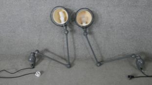 A pair of 1950's Jean Louis Domeq for Jielde, French grey industrial extendable table lights with