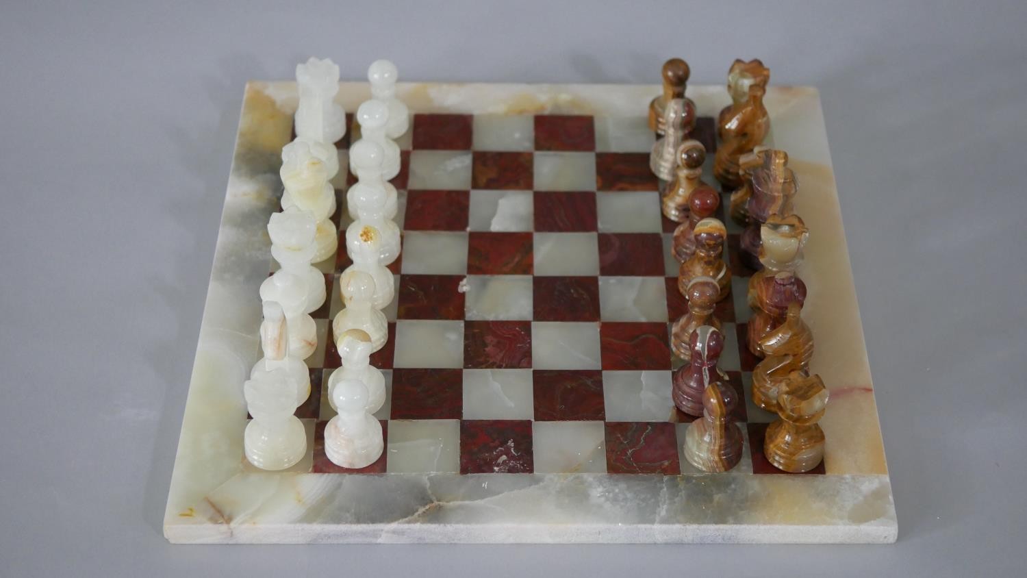 A vintage hand carved alabaster chess set with alabaster chess board. (Complete) H.1 W.30 D.30cm ( - Image 2 of 8