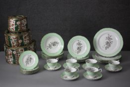 A six person vintage fine china coffee and dinner service. The service with a greyscale rose
