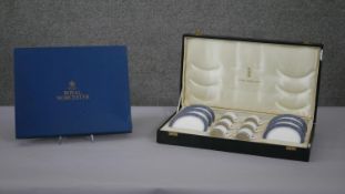 A boxed Royal Doulton six person 'Sherbrooke' pattern fine china coffee set along with a Royal