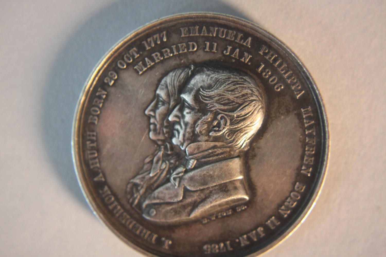 A 19th century 50th wedding day celebration silver medal. Celebrating the marriage of J. Frederick - Image 2 of 6