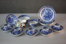 An early 20th century blue and white willow pattern part tea set. Includes five coffee cups and