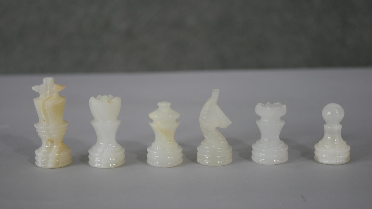 A vintage hand carved alabaster chess set with alabaster chess board. (Complete) H.1 W.30 D.30cm ( - Image 5 of 8