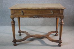 An early 20th century burr walnut William and Mary style side table with crossbanded top above