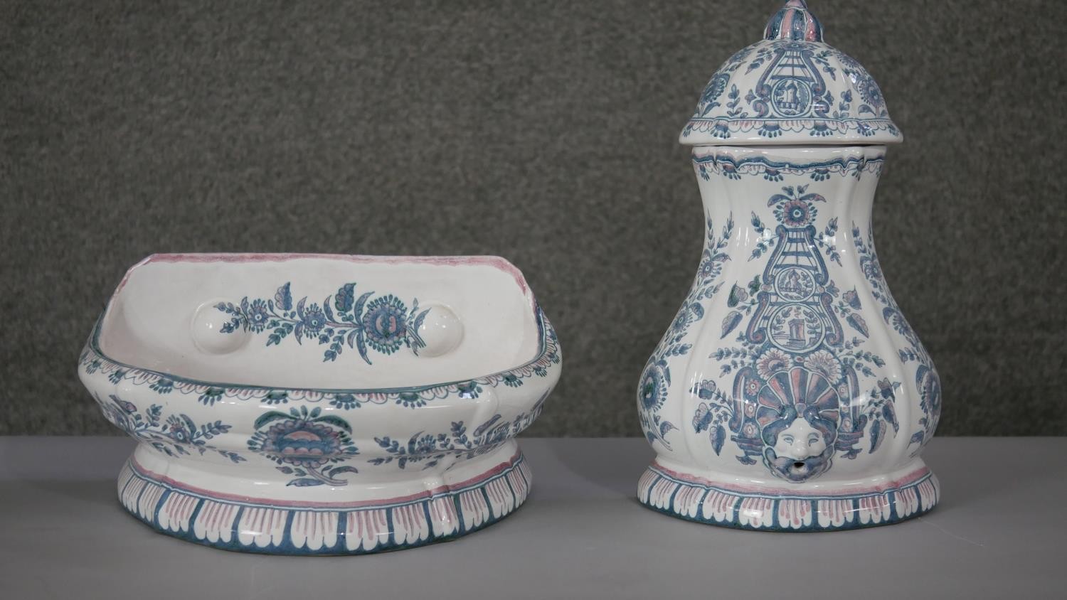 A vintage two piece hand painted Berardos Portuguese ceramic wall fountain. Decorated with a