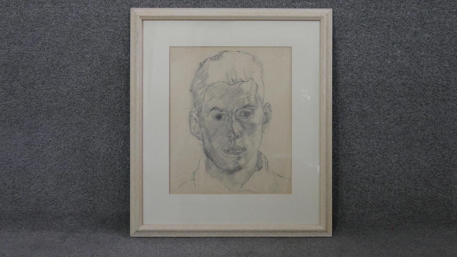 Terence Howe (B.1943) a framed and glazed pencil self portrait on paper, signed with inscription