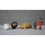 A collection of money banks. Including a Thellwell pony money box, a coconut animal moneybox, two