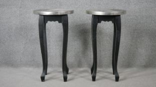 A pair of painted and ebonised urn stands on slender cabriole supports. H.71 Diam.40cm