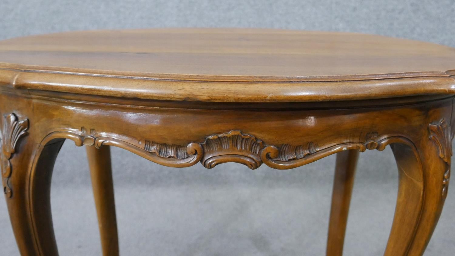 A Continental style walnut centre table on carved cabriole supports. H.55 W.72 D.54CM - Image 4 of 5