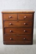 A Victorian mahogany chest of drawers with original knob handles on plinth base. H.109 W.101 D.48