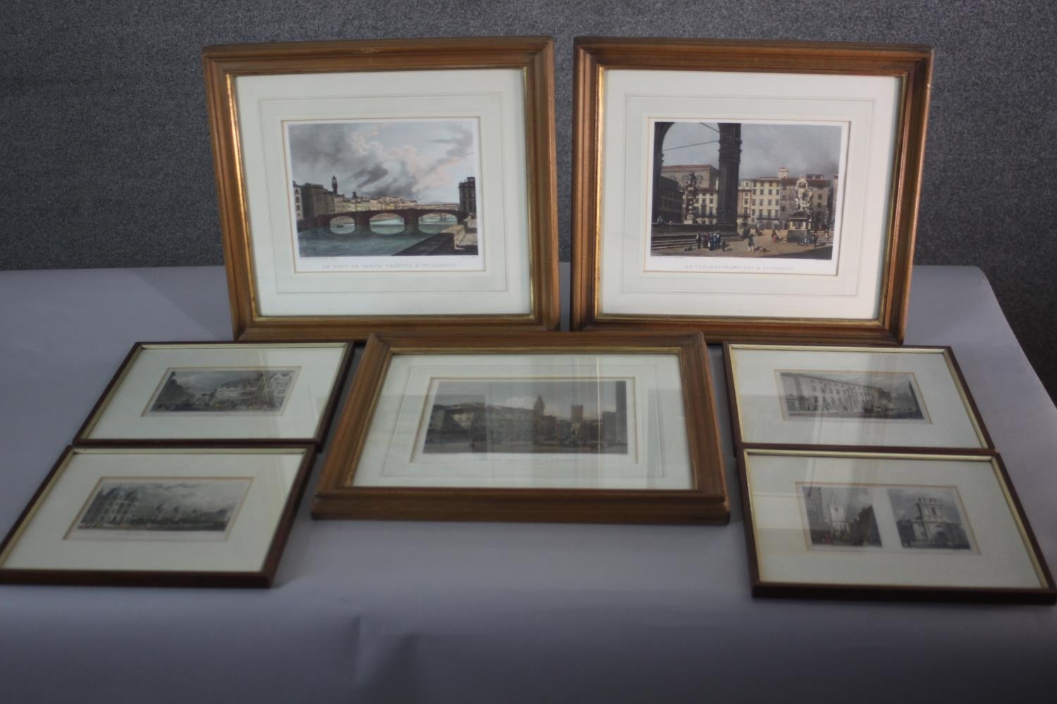 Seven framed and glazed 19th century hand coloured engravings of British places of interest. H.36