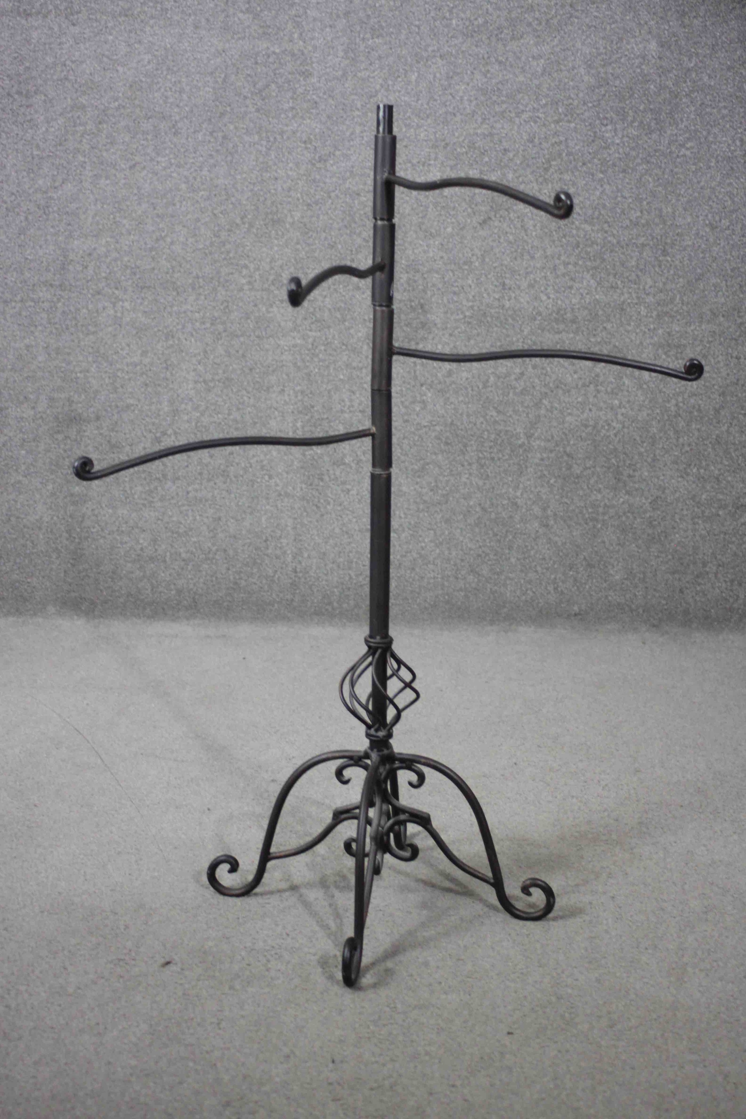 A Victorian style cast iron revolving towel rail with scrolling design base. H.102 W.106 D.40 cm. - Image 2 of 6