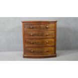 A Victorian figured mahogany bow fronted chest of drawers on plinth base. H.111 W.104 D.53cm