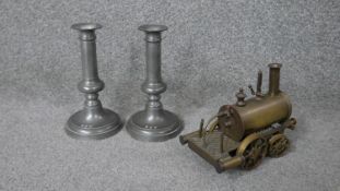 A pair of John Somers pewter candle sticks, impressed with makers mark along with an early 20th
