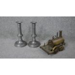 A pair of John Somers pewter candle sticks, impressed with makers mark along with an early 20th