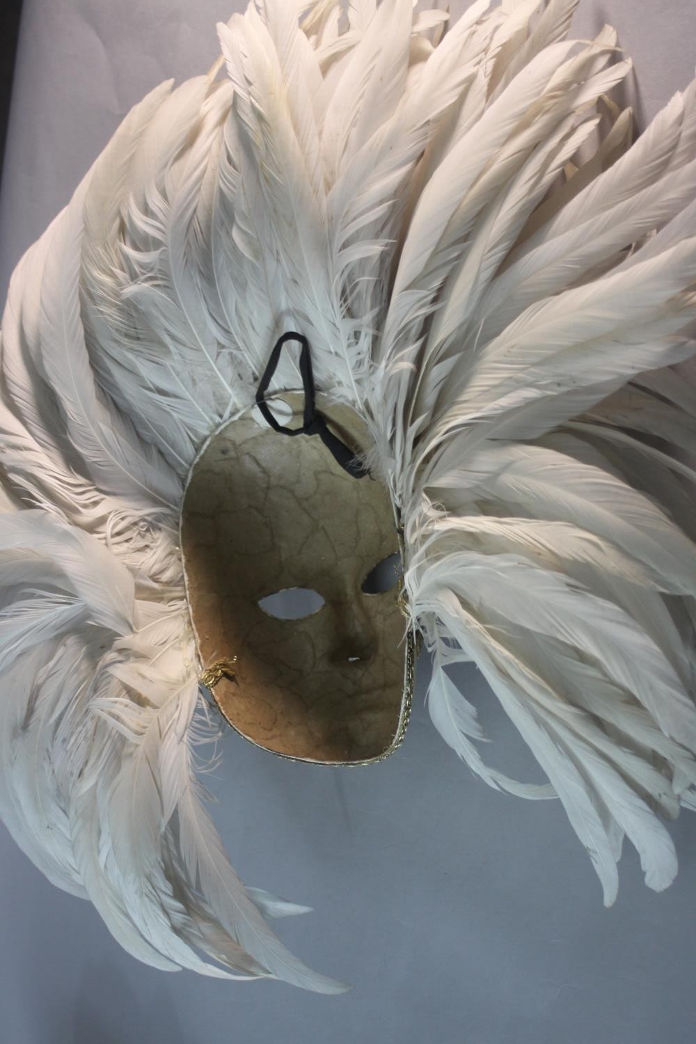A bespoke Venetian carnival mask, with gilded brocade and white cockerel's feather headdress. H.46 - Image 6 of 6
