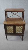 A Regency style mahogany dwarf cabinet with raised superstructure above brushing slide and grille