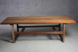 A mid century Danish vintage teak coffee table fitted with adjustable height mechanism.